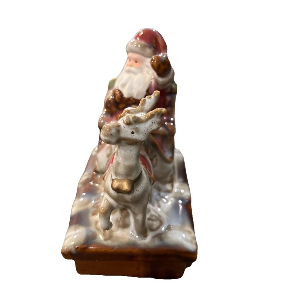 Beautifully Painted Ceramic Santa Claus with Reindeer on a Train Car